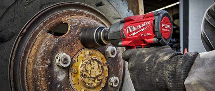 Milwaukee Power Tool fitting Tractor Wheel Tractor wheel being fitted with Milwaukee Power Tool